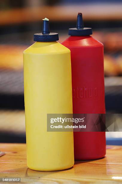 Mustard and ketchup in plastic bottles