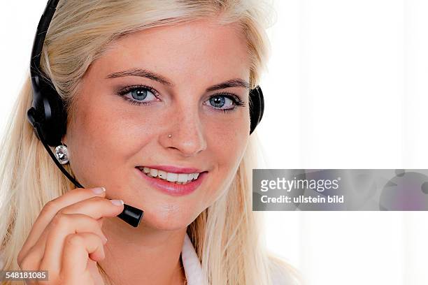 Woman with headset in a call center -