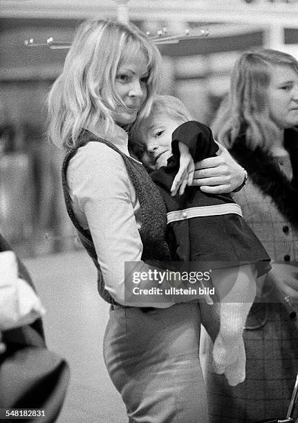 People, physical handicap, fostress carries a handicapped girl on her arms, aged 25 to 30 years, aged 3 to 4 years, Anne, Carola, Special School...