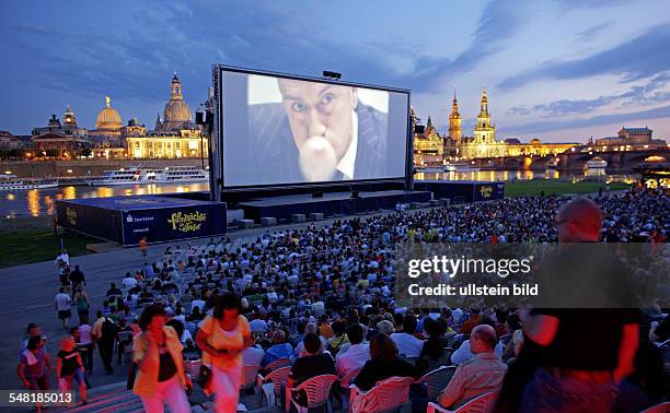 Federal Republic of Germany Saxony Dresden - film nights at Elbe bank; people watching a film at open-air cinema