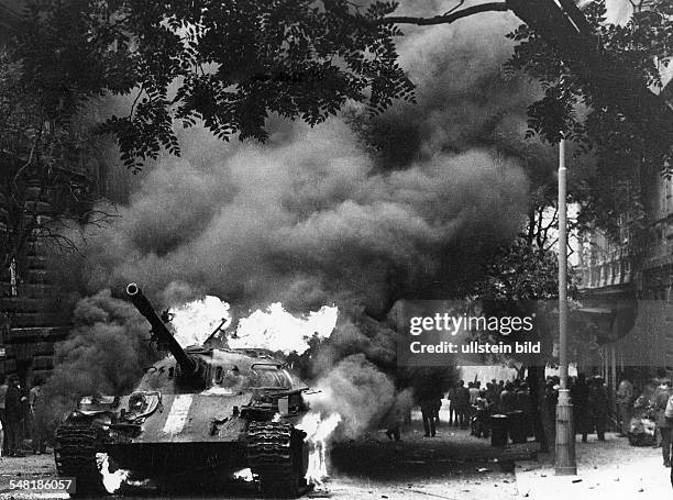 Prague Spring - Suppression Demonstrations and protests against the invasion of Czechoslovakia by troops of the Warsaw Pact countries| burning tank...