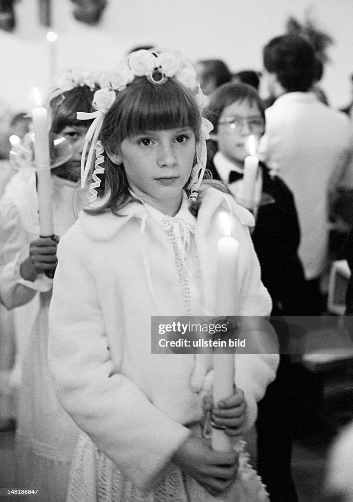 Religion, Christianity, First Communion, during the procession to the church girls and boys hold communion candles in the hands, aged 8 to 12 years - 13.04.1980
