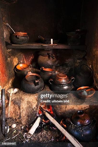 Peru - Isla Amantani; fireplace in the jitchen of the Quechua