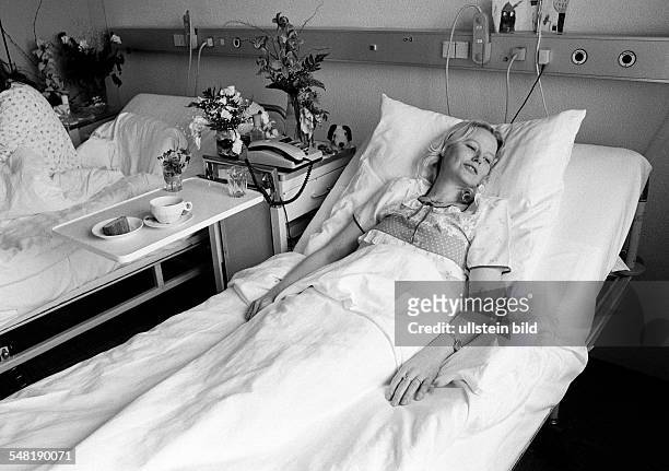 People, health, young woman lies in a sickbed of a hospital, aged 30 to 40 years, Elisabeth -