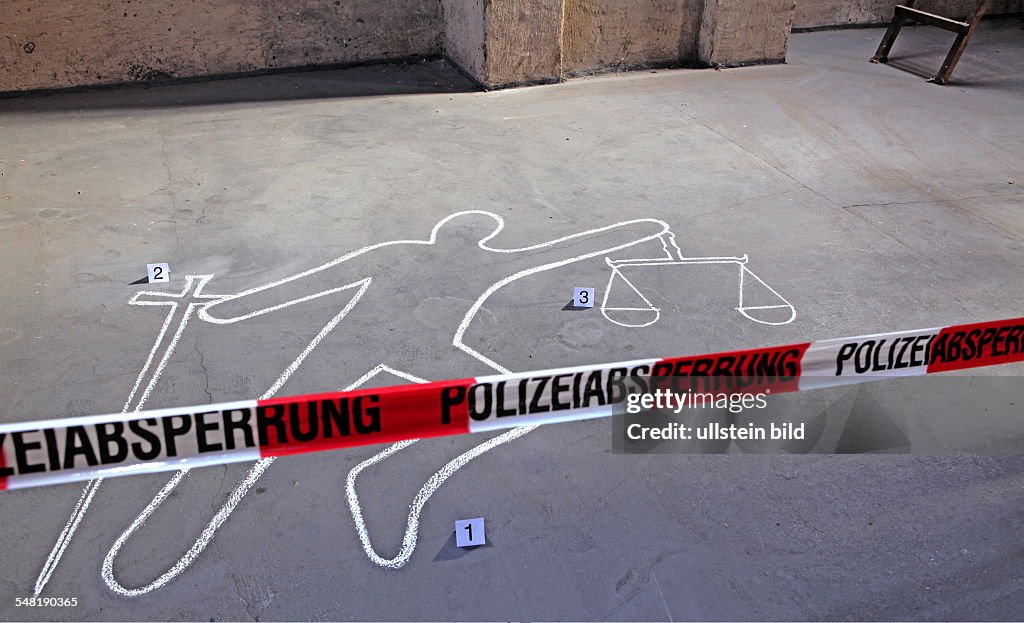 Symbolic phot justice, victim, silhouette of a victim at a scene of the crime