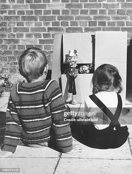 Children playing "Punch and Judy show" - 1960ies