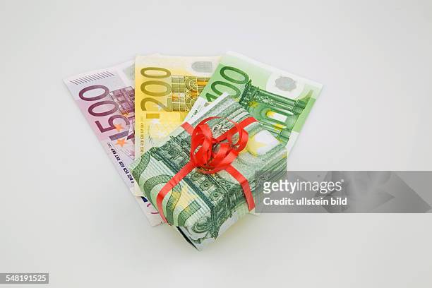 Symbolic photo gift of money, savings package