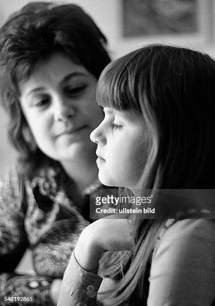 People, young woman talking with a girl, aged 30 to 40 years, aged 10 to 12 years, Doris, Birgit -