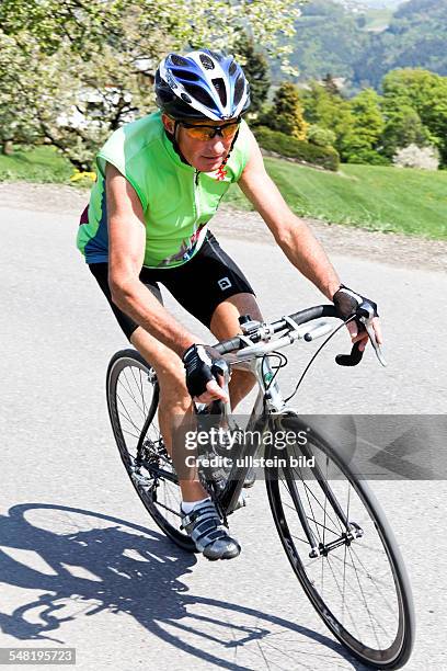 Senior on a racing bicycle