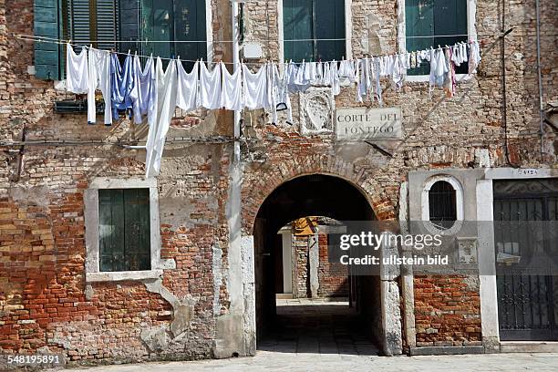 Italy Veneto Venezia - drying laundry in a court