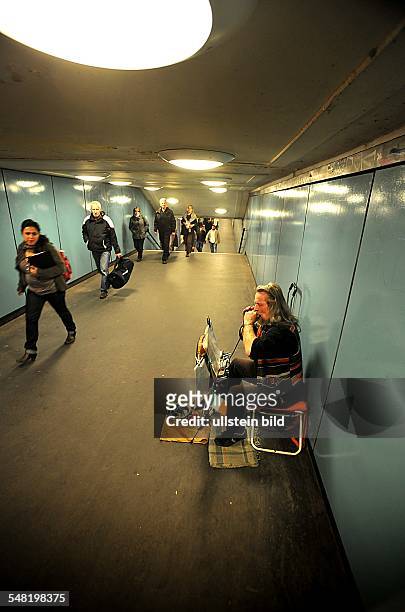 Germany Berlin Kreuzberg - street musician Peter Zerbe at subway station Hallesches Tor -