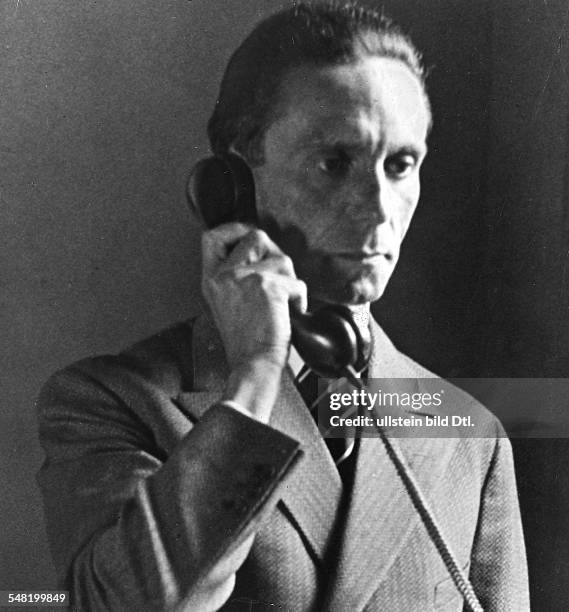 Joseph Goebbels *29.10.1897-+ Politician, Nazi Party, Germany - on the phone in his study - 1933 - Photographer: James E. Abbe - Vintage property of...
