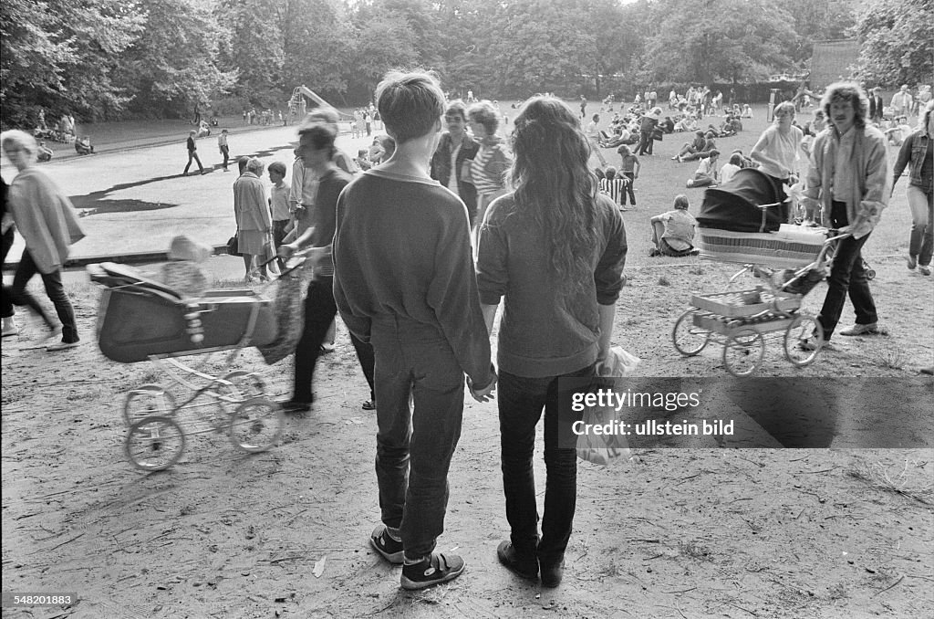 German Democratic Republic Bezirk Berlin (Ost-Berlin) East Berlin - Weissensee: people in the park - 1980