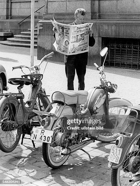 Germany Bavaria Regensburg - man reading the newspaper BILD