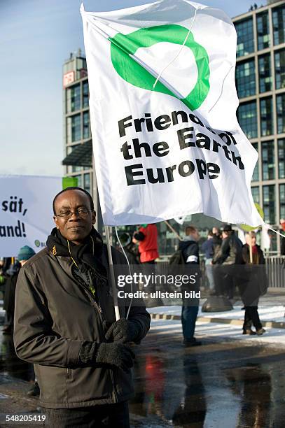 Bassey, Nnimmo - Poet, Environmentalist Activist, Nigeria - elected chair of Friends of the Earth during demonstration againt poor animal husbandry...