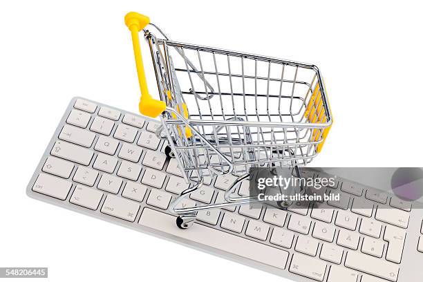 Symbolic photo online shopping, computer keyboard and shopping cart