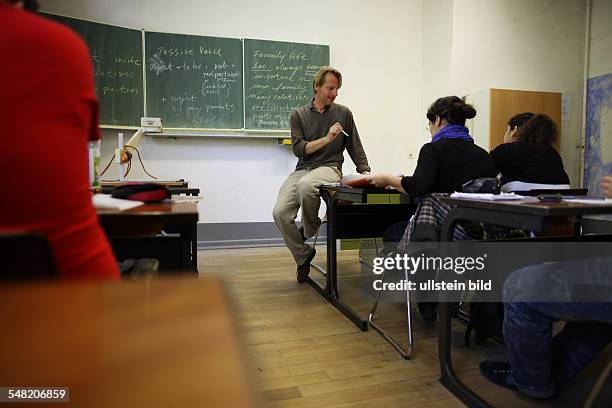 Germany Berlin - students and teacher at school -