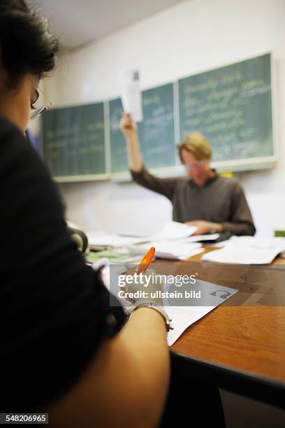 Germany Berlin - students and teacher at school -