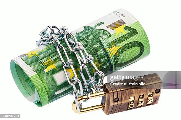 Euro banknotes with chain and padlock