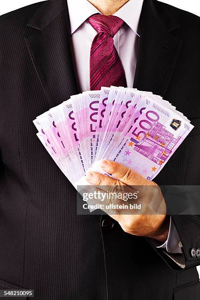 Business man with 500 Euro banknotes