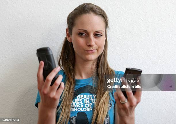 Young woman with telephone -