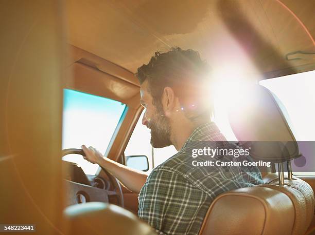 young couple on a roadtrip - car interior side stock pictures, royalty-free photos & images