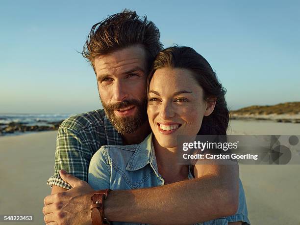 young couple on a roadtrip - couple portrait fotografías e imágenes de stock