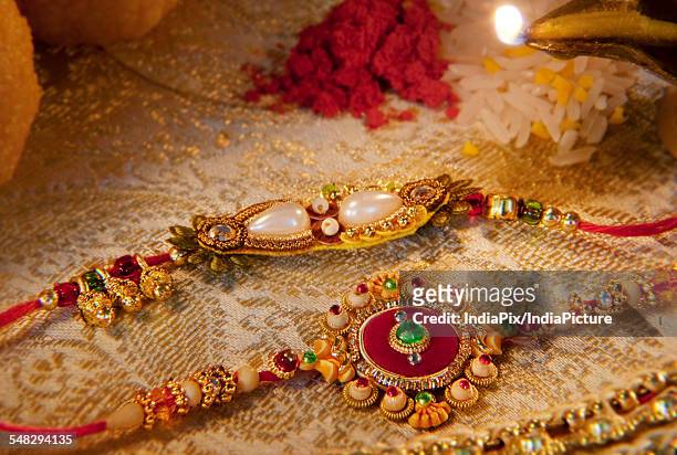 close-up of rakhis - festival wristband stock pictures, royalty-free photos & images