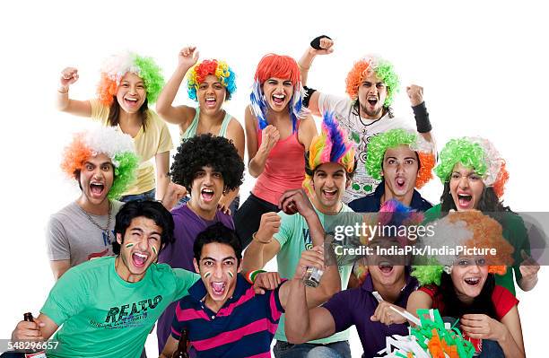 portrait of youngsters with wigs cheering - beer bottle mouth stock pictures, royalty-free photos & images