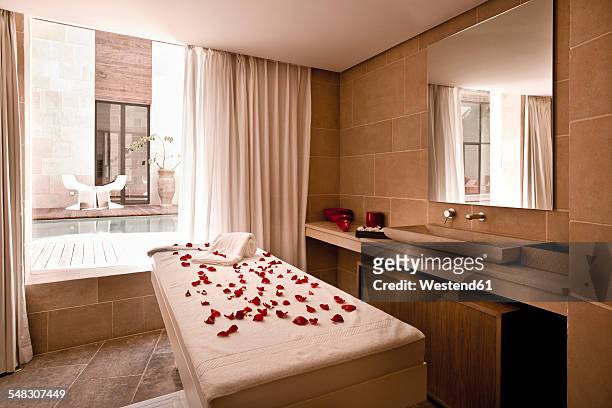 morocco, fes, hotel riad fes, massage table at spa - massage table stock pictures, royalty-free photos & images