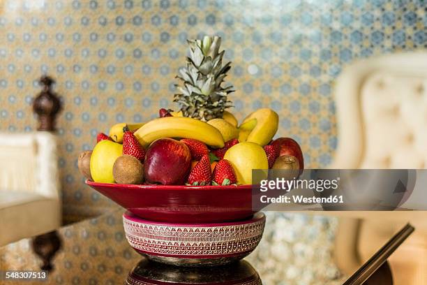 morocco, fes, hotel riad fes, bowl with fruits in a hotel room - fruit bowl stock pictures, royalty-free photos & images