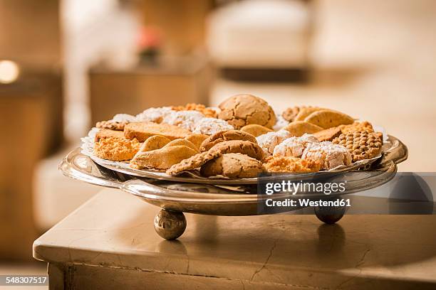 morocco, fes, hotel riad fes, plate of different cookies - fes morocco stock pictures, royalty-free photos & images