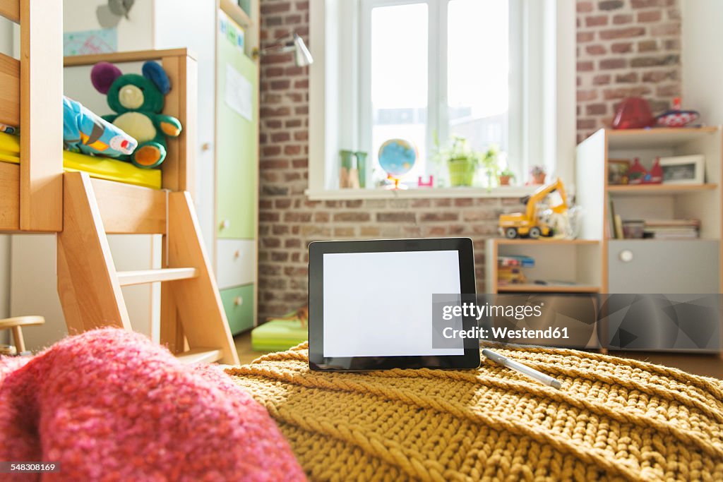 Tablet computer in children's room