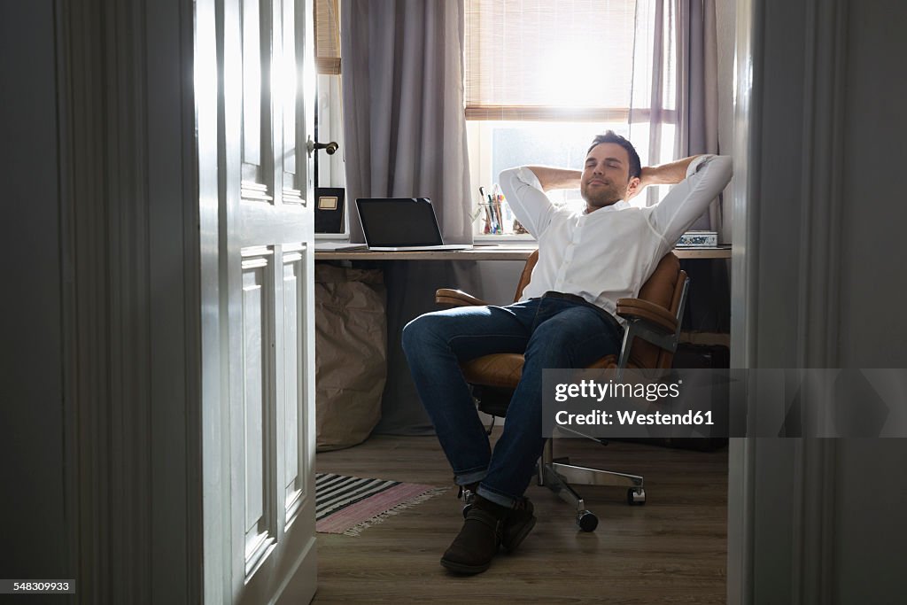 Man having a break at his home office