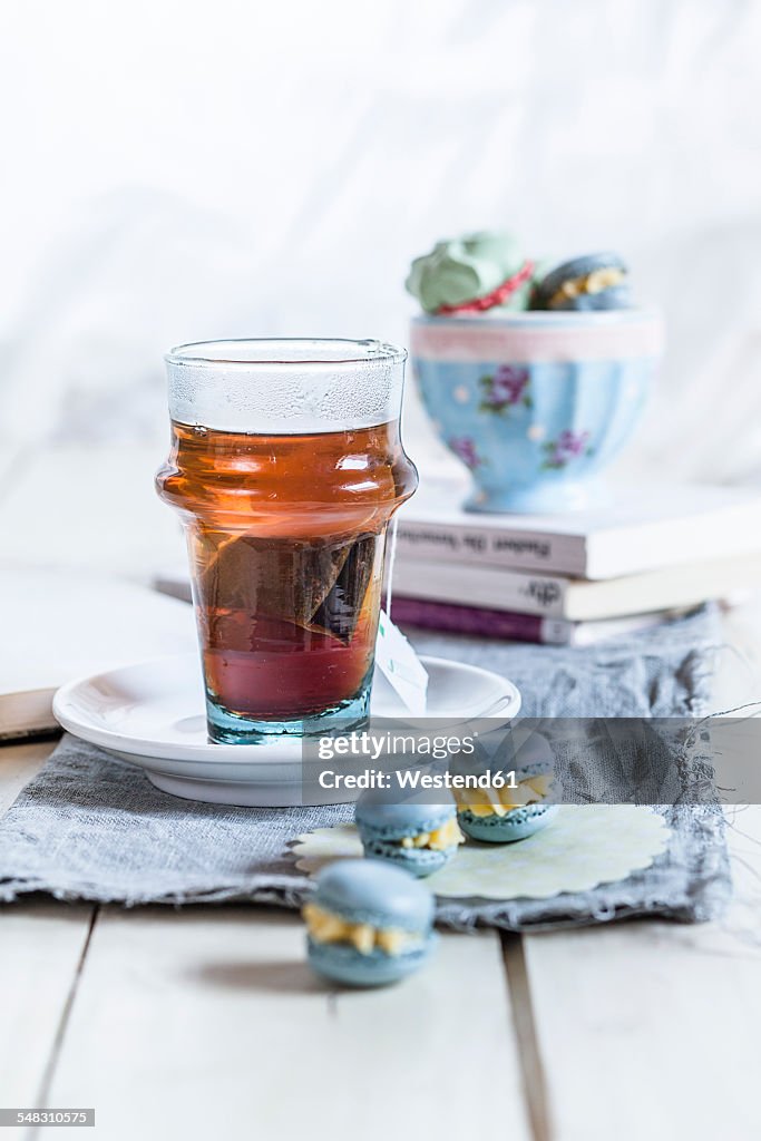 Black tea, french macarons and books