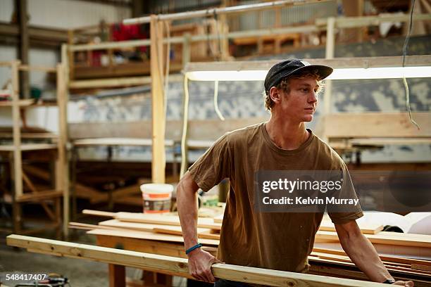 boat building craftsmen - passion foto e immagini stock