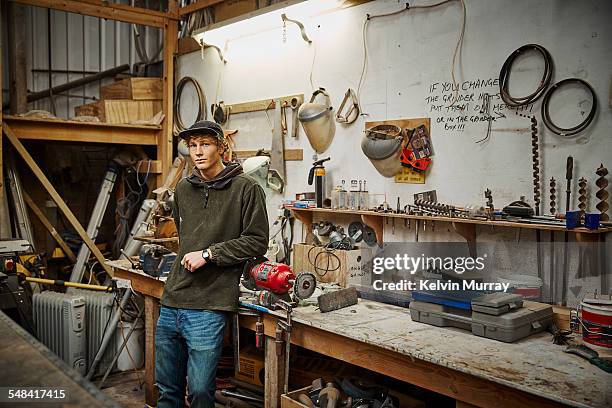 boat building craftsmen - confident young man at work stock pictures, royalty-free photos & images