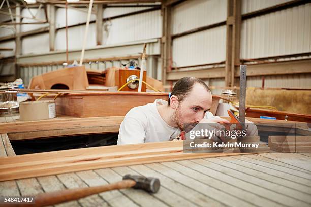 boat building craftsmen - ship builders stock pictures, royalty-free photos & images