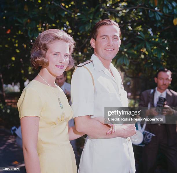 King Constantine II of Greece and his fiancee, Princess Anne-Marie of Denmark pictured together at the Greek royal summer residence in Corfu on 23rd...