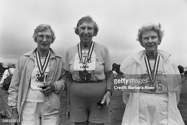 The winners of the 1,500 metres Race Walk at the National Senior Sports Classic in Syracuse, New York State, USA, 30th June 1991.