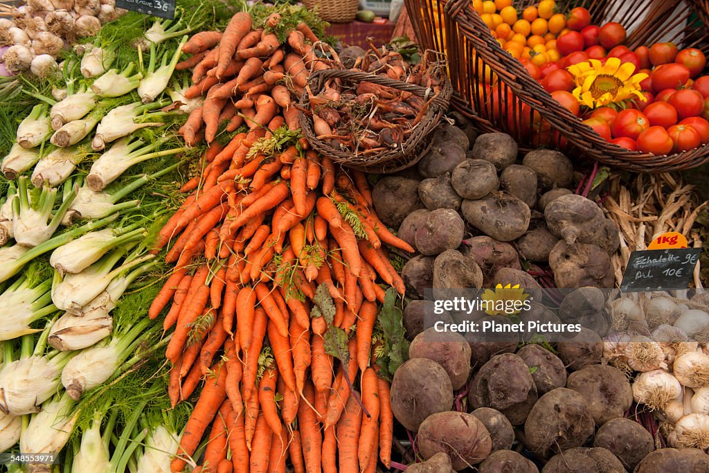 Display of fresh vegetables on market stall, Issigeac, France