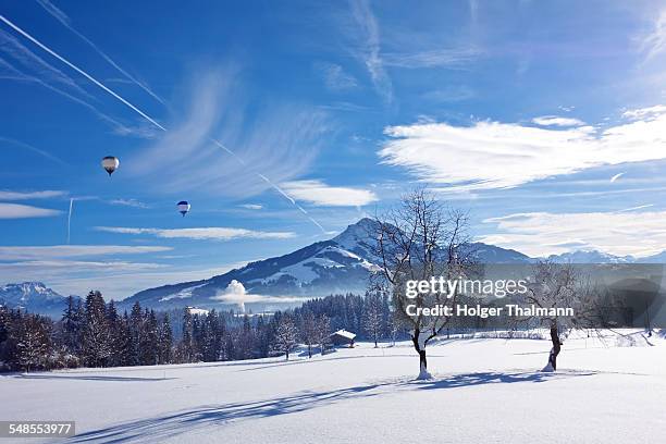 rural scene in snow, kirchberg, austria - kirchberg austria stock pictures, royalty-free photos & images