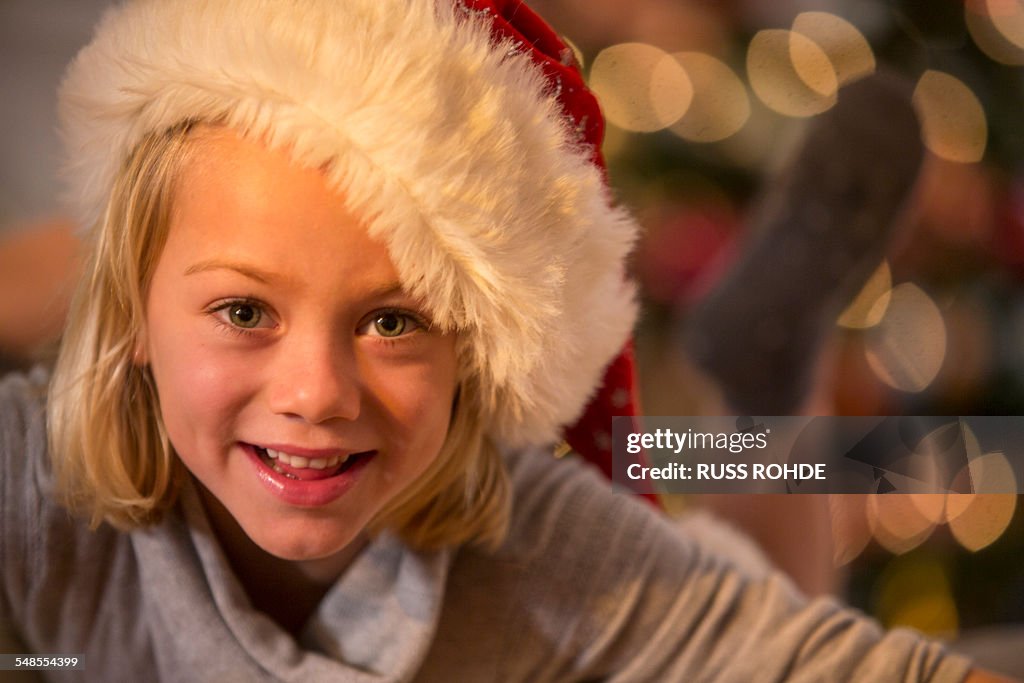 Girl wearing Christmas hat
