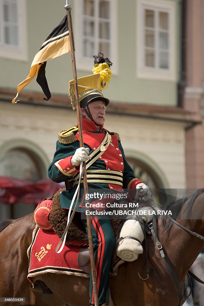 Man riding horse in historical battle reenactment, Mikulov, Czech Republic