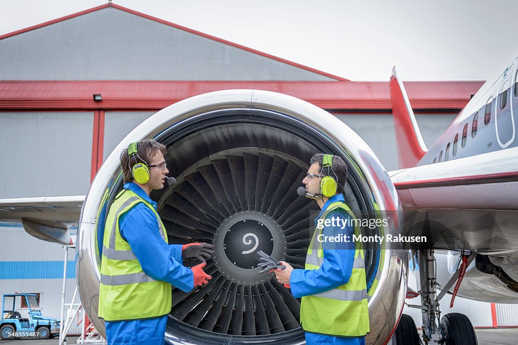 Pilot Inspecting Engine Airside Engineers Inspecting Jet Engine Of Aircraft High-Res Stock ...