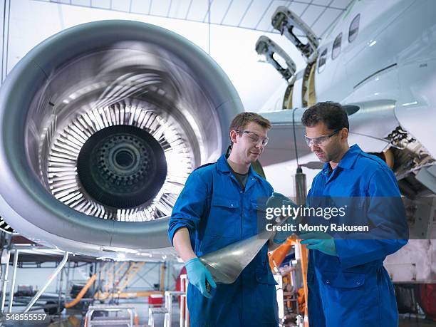 Pilot Inspecting Engine Aircraft Engineers Inspecting Jet Turbine Photos and Premium High Res ...