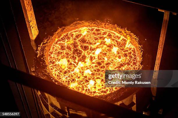 high angle view of molten steel flask in steelworks - sheffield steel stock pictures, royalty-free photos & images