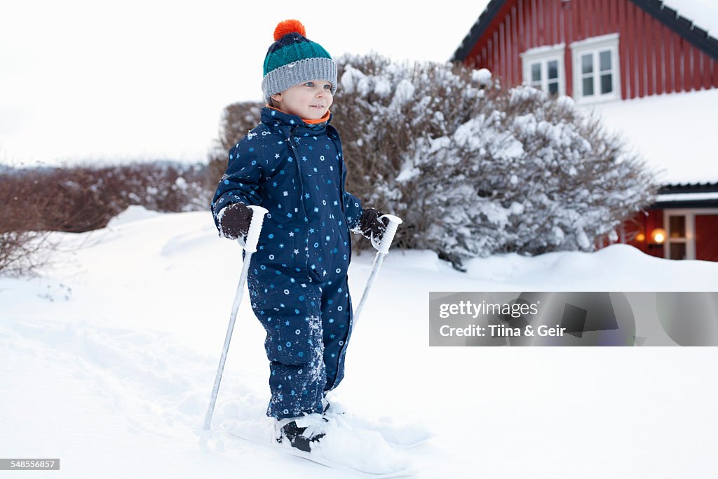 Boy learning to use his skis
