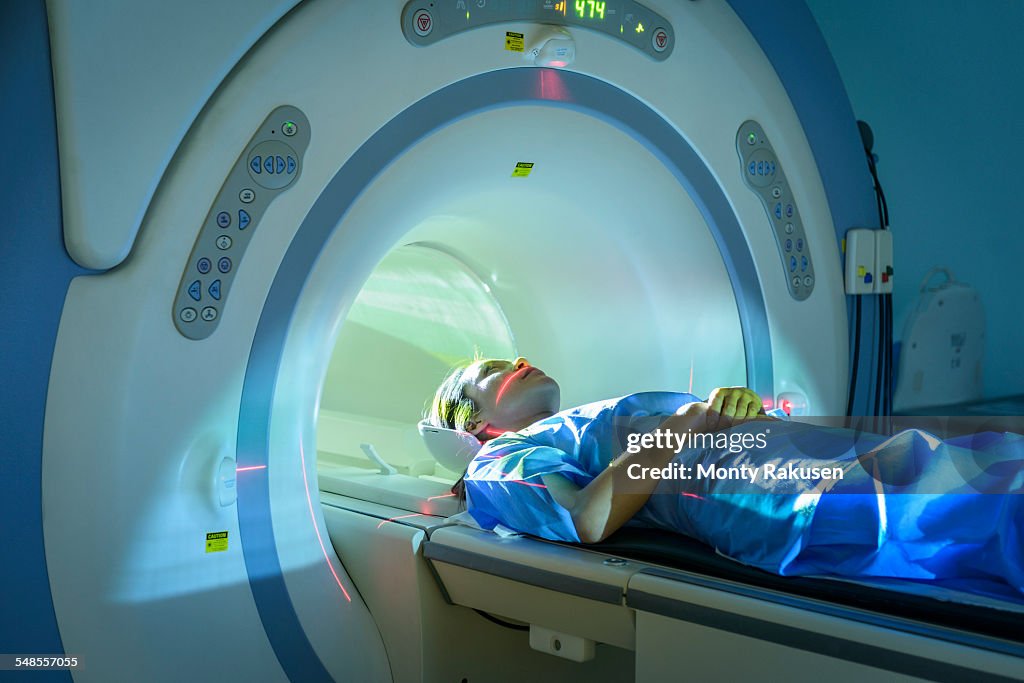 Patient entering Magnetic Resonance Imaging (MRI) scanner