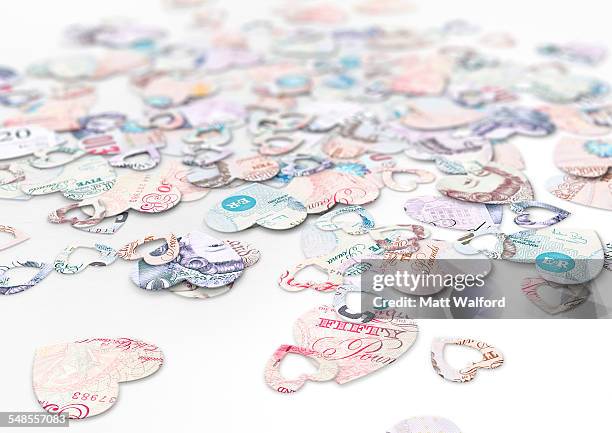 confetti made from uk pound notes - ten pound note stock pictures, royalty-free photos & images